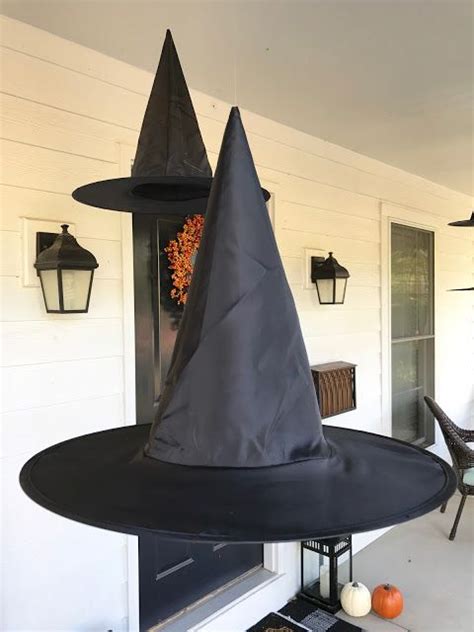 Create an eerie ambiance with a floating witch decoration